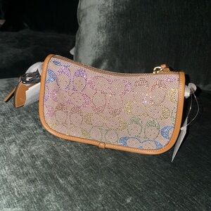 Coach rainbow crystal BNWT Swinger Bag 20 with Chain In Signature Jacquard